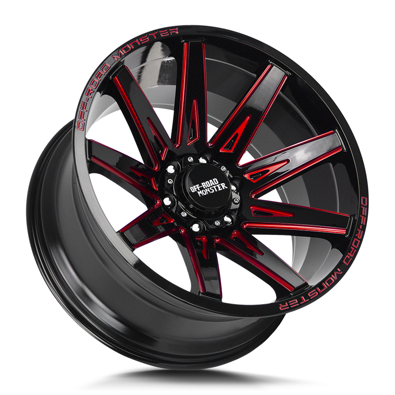 The M25 Wheel by Off Road Monster in Gloss Black Candy Red Milled